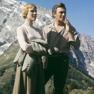 Main characters from The Sound Of Music - 1965 - against a mountain background