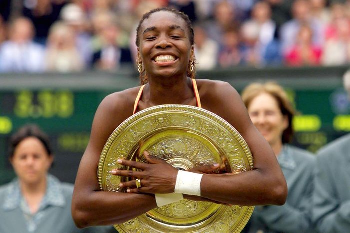 Wimbledon United Kingdom: Us Player Venus Williams Clutches Tight the Trophy After Winning the Womens Singles Final at the Wimbledon 2000 Tennis Tournament Against Compatriot Lindsay Davenport on Saturday 08 July 2000 Williams Won the Match in 6-3 7-6