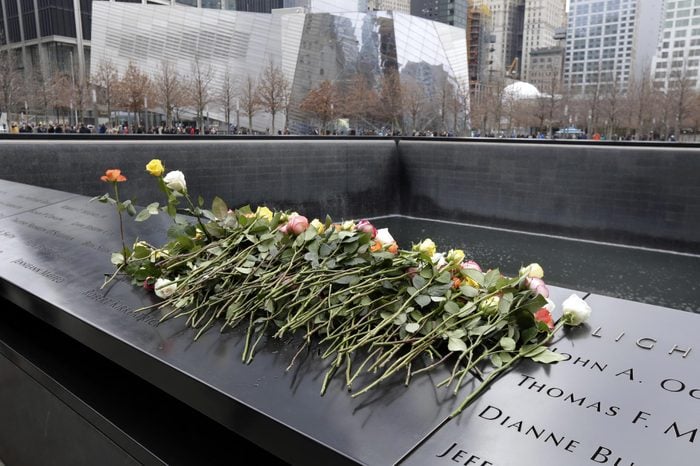 Roses are placed on the 9/11 Memorial during 25th anniversary ceremony to commemorate the six victims of the February 26, 1993 World Trade Center bombing, in New York