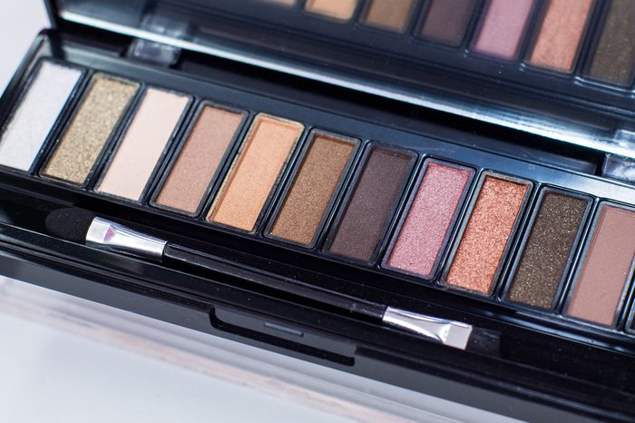 A Palette of Eyeshadow with Many Colors. Cosmetics for Beautification, Make-Up. Comes with a 2-way Brush