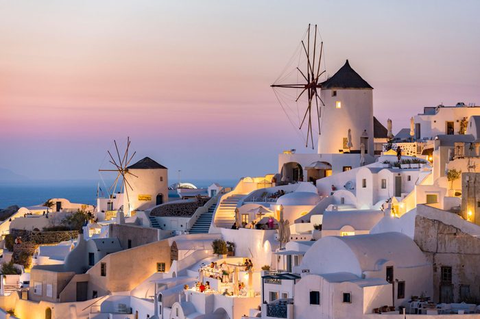 Town, windmills, dusk, Oia, Santorini, Cyclades, Greece