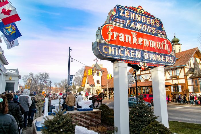 Families wait in a line outside Zehnder's in Frankenmuth to share a delicious and warm chicken dinner during Zehnder's Snowfest.