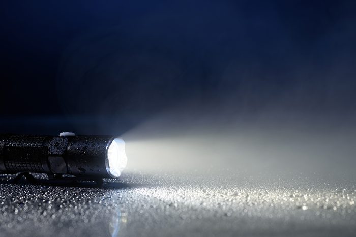 Tactical waterproof flashlight with water drops and fog