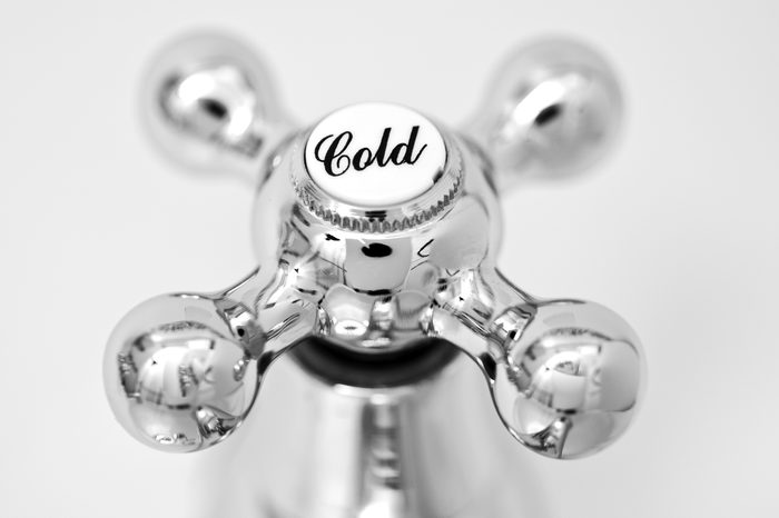 Cold tap; close-up image of cold tap or faucet, covered with condensation; strong differential focus