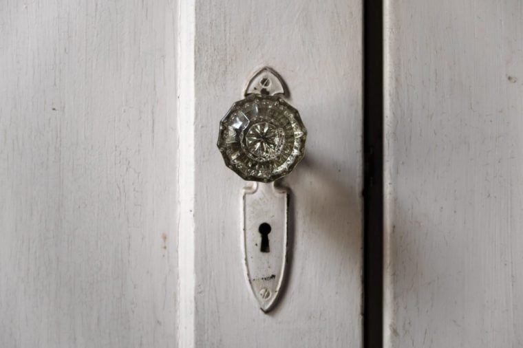 Crystal doorknobs in an old abandoned house. 