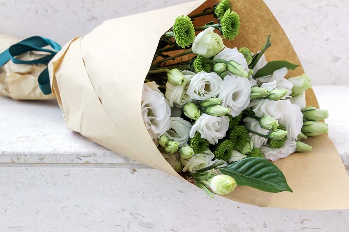 Wrapped white eustoma flowers bouquet 