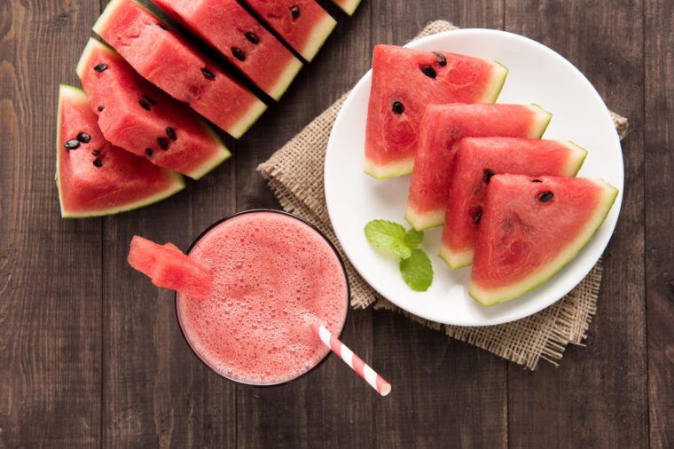 Top view healthy watermelon smoothie on a wood background.