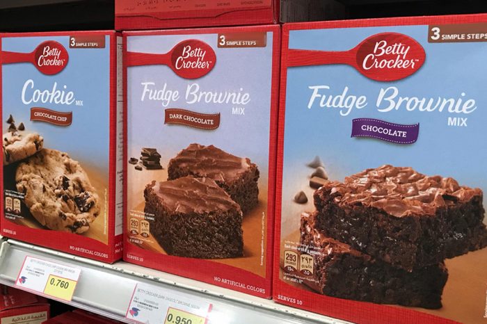 Close up view of Betty Crocker brand of cookie and brownie mixture lined up on shelves in the market. Baking cake for preparation of having it on Eid Mubarak.