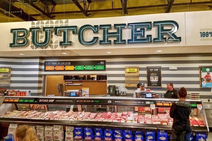 Whole Foods natural organic retail store butcher meat ordering counter, Lynnfield Massachusetts USA, May 11, 2018
