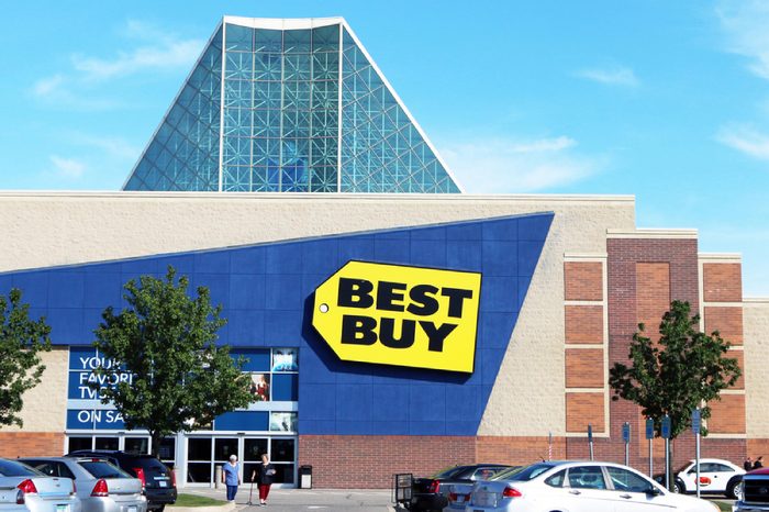 TAYLOR, MI-OCTOBER, 2015: Customers leaving a Best Buy store in this Detroit suburb. Note the glass roof which allows natural light into the store.