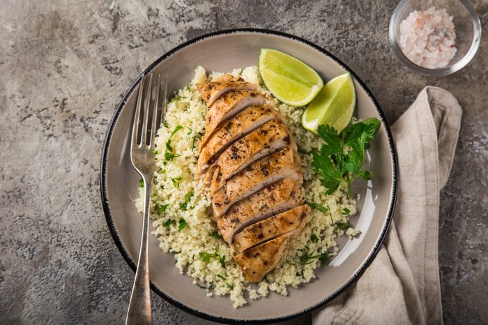 grilled chicken breast with couscous, top view