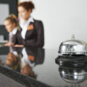 Modern luxury hotel reception counter desk with bell