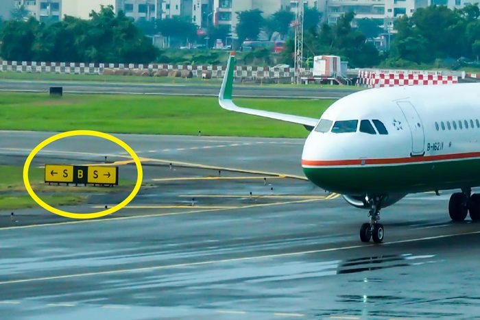 Kaohsiung , Taiwan - OCT 03 , 2017 : Evaair aircraft landed and drive in taxiway at Kaohsiung international airport , view from terminal