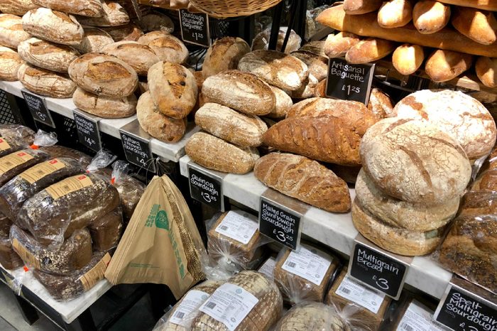 LONDON - APRIL 5, 2018: Freshly Baker artisanal bread products on sale at Whole Foods Market in Piccadilly Circus, Westminster, London, UK.