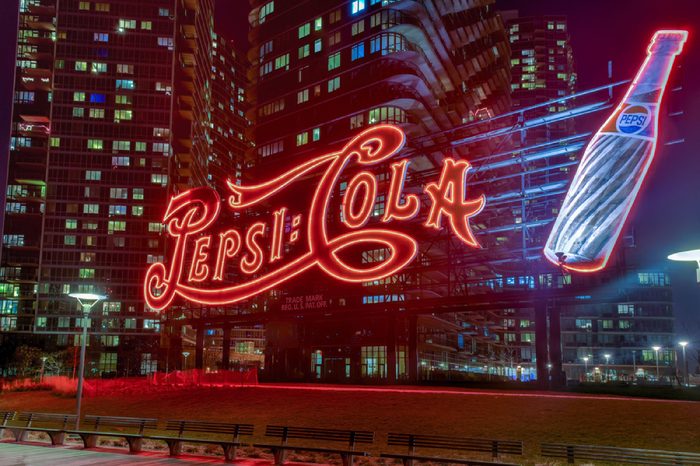 New York City - January 2, 2016: PepsiCola sign and Queensboro Bridge at night as seen from Gantry Plaza, Long Island.