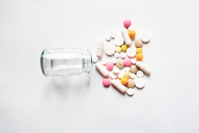 pills pouring out of bottle