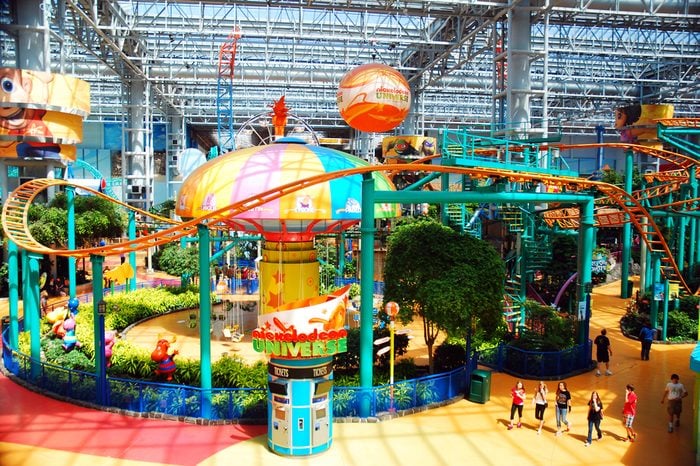 Bloomington, MN, USA May 14, 2013 Teenage friends stroll around the indoor amusement park in the Mall of America in Bloomington, Minnesota