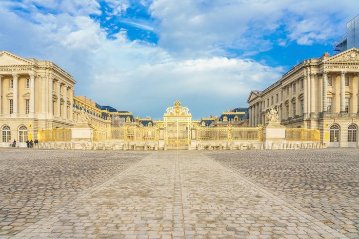 Main entrance of Versailles Palace, Versailles, France on april 08, 2018. Palace Versailles was a royal chateau. It was added to UNESCO list of World Heritage Site