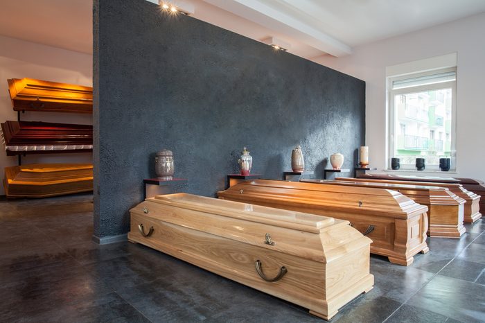 Coffins standing in funeral house