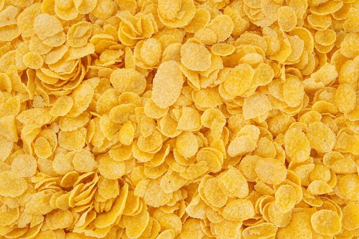 Corn-flakes background and texture, cornflake cereal box for morning breakfast.