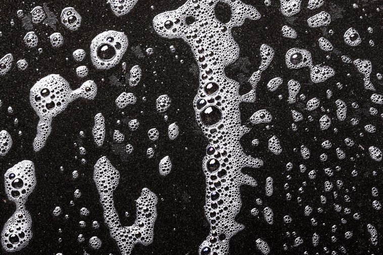 Soap bubbles black and white texture. 