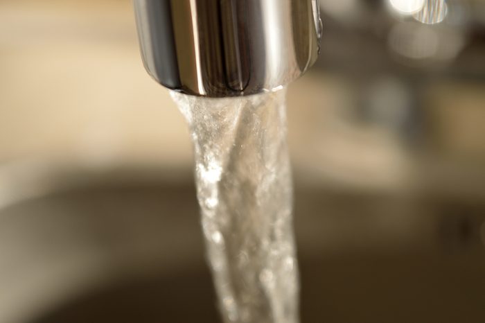 Close-up of running water from a faucet.