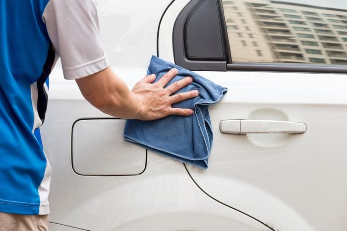 cleaning car with microfiber cloth