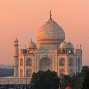 View of Taj Mahal at sunset in Agra, Uttar Pradesh, India. It was build in 1632 by Emperor Shah Jahan as a memorial for his second wife Mumtaz Mahal.