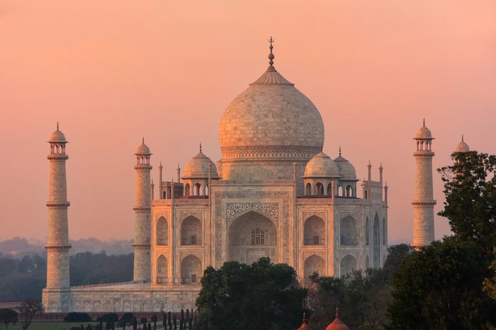 View of Taj Mahal at sunset in Agra, Uttar Pradesh, India. It was build in 1632 by Emperor Shah Jahan as a memorial for his second wife Mumtaz Mahal.