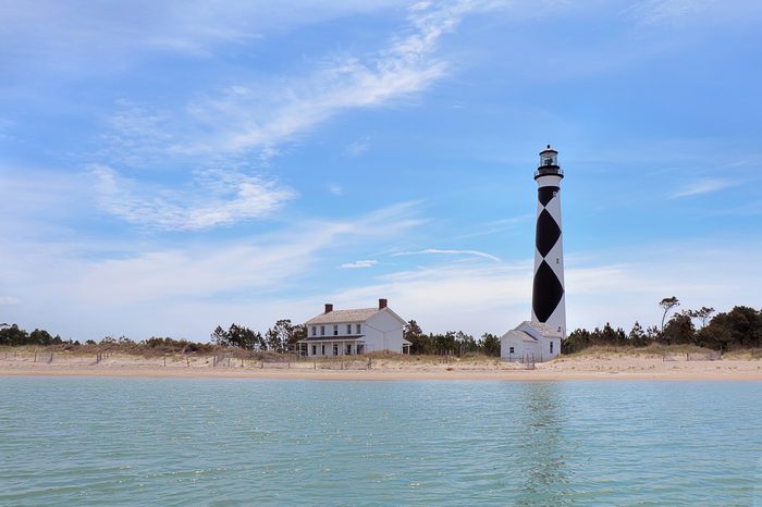Cape Lookout Lighthouse on the Southern Outer Banks or Crystal Coast of North Carolina viewed from the water