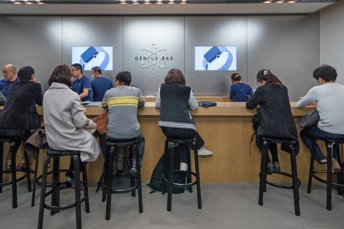 TOKYO, JAPAN - CIRCA MARCH, 2017: Customers at Genius bar inside Apple Store. Apple Inc. is an American multinational technology company headquartered in Cupertino, California.