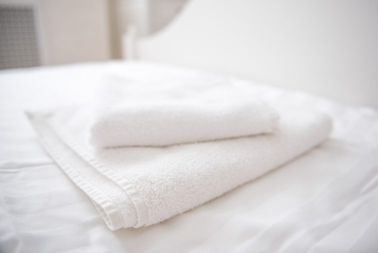 white towels on the bed