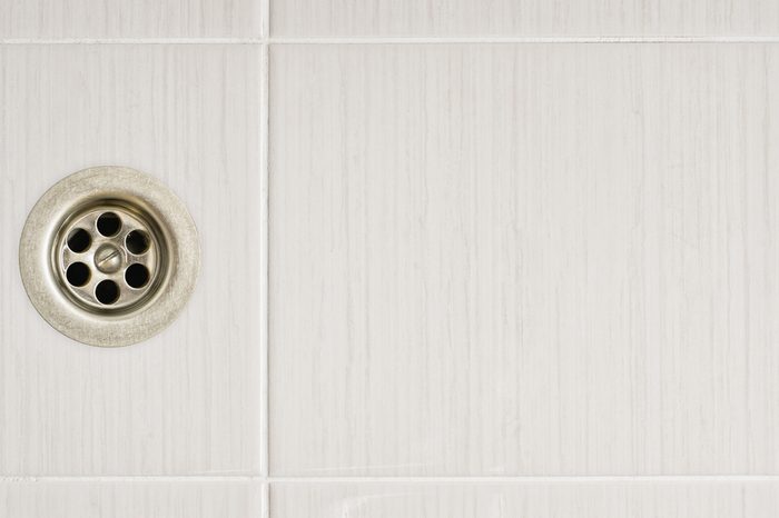 The shower drain with tile floors