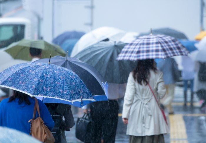 Tokyo commuting · rainy day · June