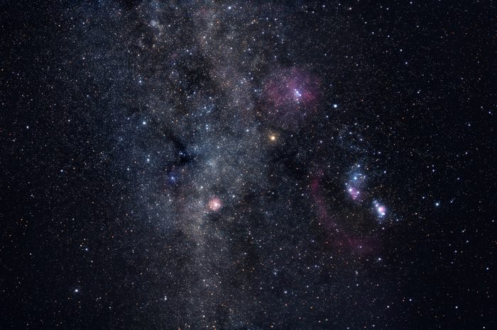 Deep space image containing constellations Orion, Monoceros, Gemini and many bright nebulae and star clusters