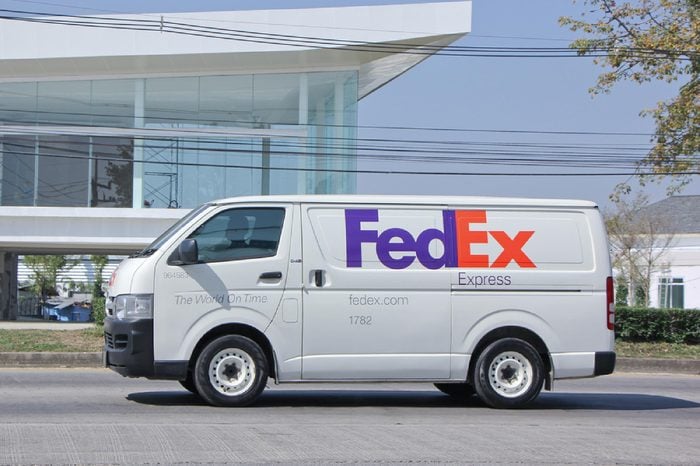 CHIANGMAI, THAILAND -JANUARY 29 2015: Fedex logistic van. Photo at road no 1001 about 8 km from downtown Chiangmai, thailand.