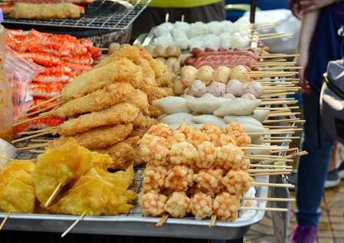 Street food for sale in market in Bangkok Thailand