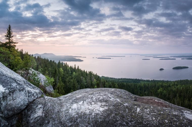 Scenic landscape with lake and sunset at evening in Koli, national park, Finland