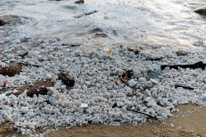 Clumps of palm oil dot the sand on Hung Shing Yeh Beach in Hong Kong, China, 06 August 2017. Nearly a dozen beaches across Hong Kong were closed to the public on 06 August, after congealed palm oil washed up on them. A Marine Department spokesman confirmed that two ships collided in the Pearl River estuary, in mainland Chinese waters, on 03 August and said that some of the vessel's cargo, palm oil, leaked into the sea. Palm oil is an edible vegetable oil from the fruit pulp of oil palm trees.