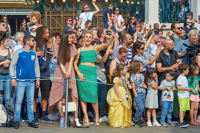 Tallia Storm and Emily Canham enjoy Disney Stars on Parade during the launch of Marvel Summer of Super Heroes at Disneyland Paris.