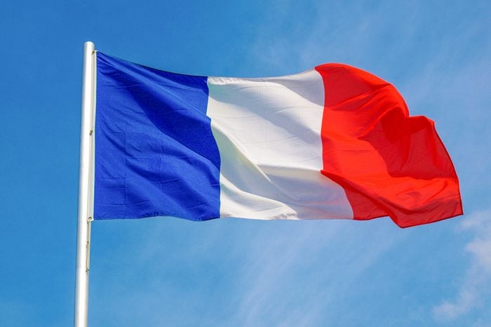 Flag of France over a blue sky
