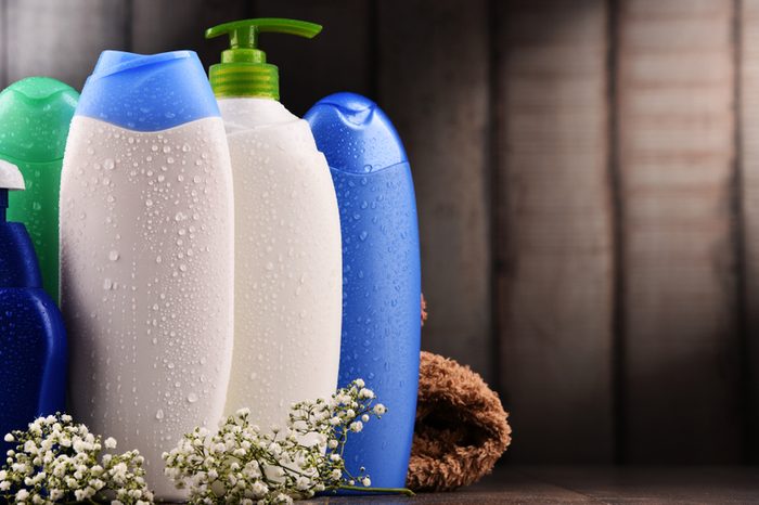 Plastic bottles of body care and beauty products.