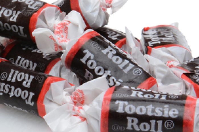 IRVINE, CALIFORNIA - DECEMBER 12, 2014: A box of Tootsie Roll 'Midgee' Candy. Tootsie Roll Industries is one of the largest candy manufacturers in the world, making than 64 million Tootsie Rolls daily
