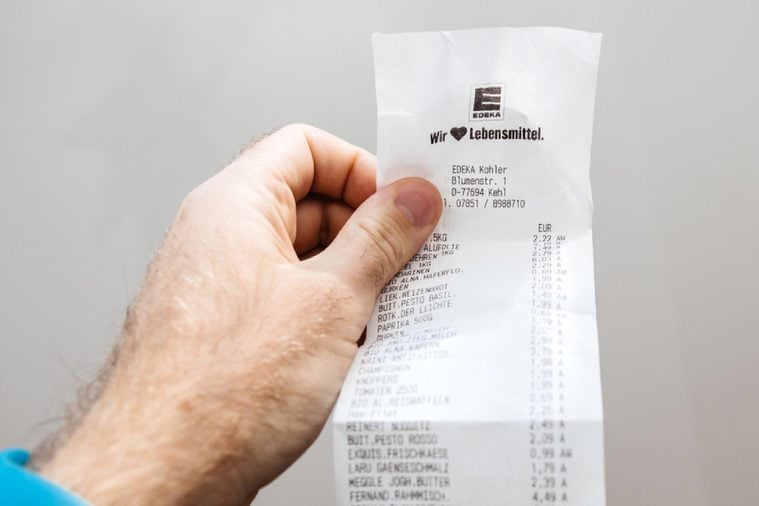 PARIS, FRANCE - FEB 21, 2018: Macro detail of Supermarket receipt issued in Germany by Edeka food supermarket