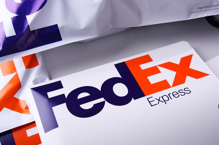 POZNAN, POL - APR 26, 2018: Envelopes and parcels of FedEx, an American multinational courier delivery services company headquartered in Memphis, Tennessee.