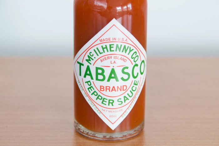 Pruszcz Gdanski, Poland - April 7, 2018: Close-up for Tabasco logo on bottle. Tabasco sauce is hot sauce made from tabasco peppers, vinegar and salt.