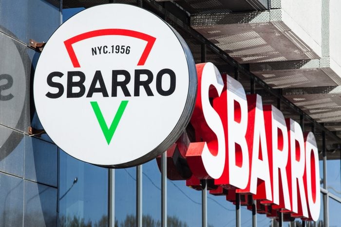 Signboard Sbarro on the building. Sbarro is a chain of pizza restaurants that specializes in Italian-American cuisine