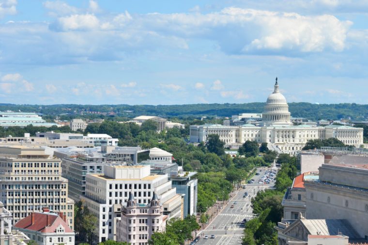 Washington D.C. - An aerial view of Pennsylvania Avenue with federal buildings including US Archives building, Department of Justice, FBI Headquarters and US Capitol Hill