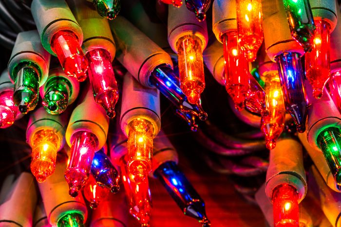 String of multicolor Christmas lights with green wiring.