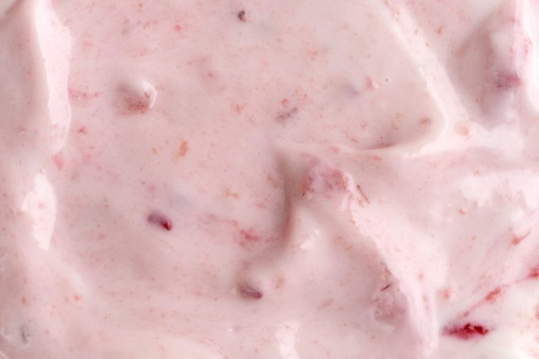 A very close view of raspberry yogurt.